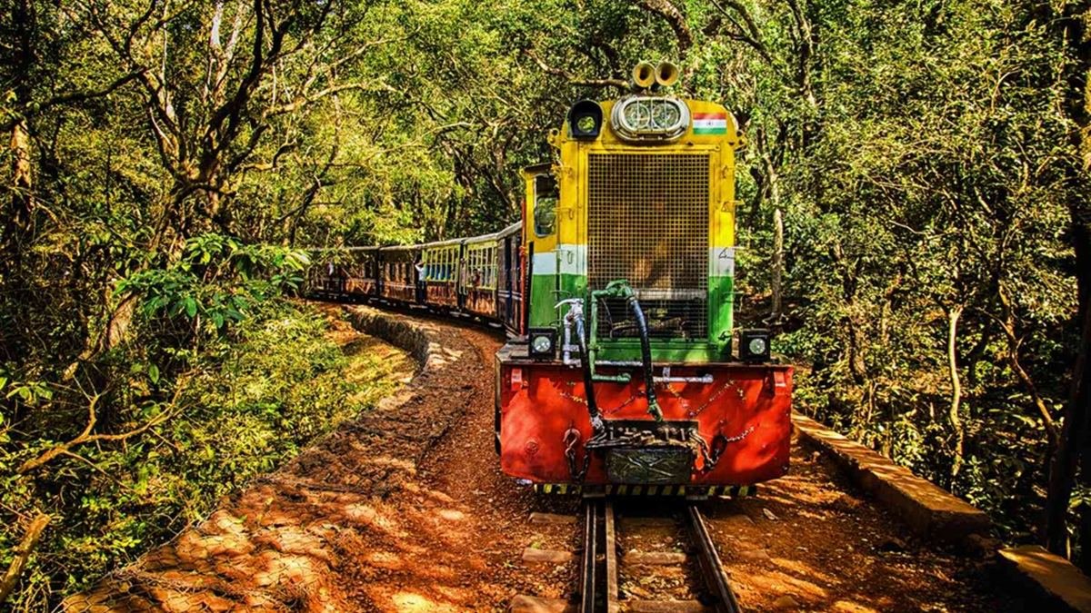 Neral–Matheran toy train running through the forest at Matheran